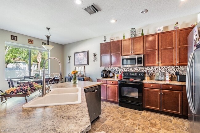 Building Photo - 4 br, 3 bath House - 6716 Bluff Meadow Court