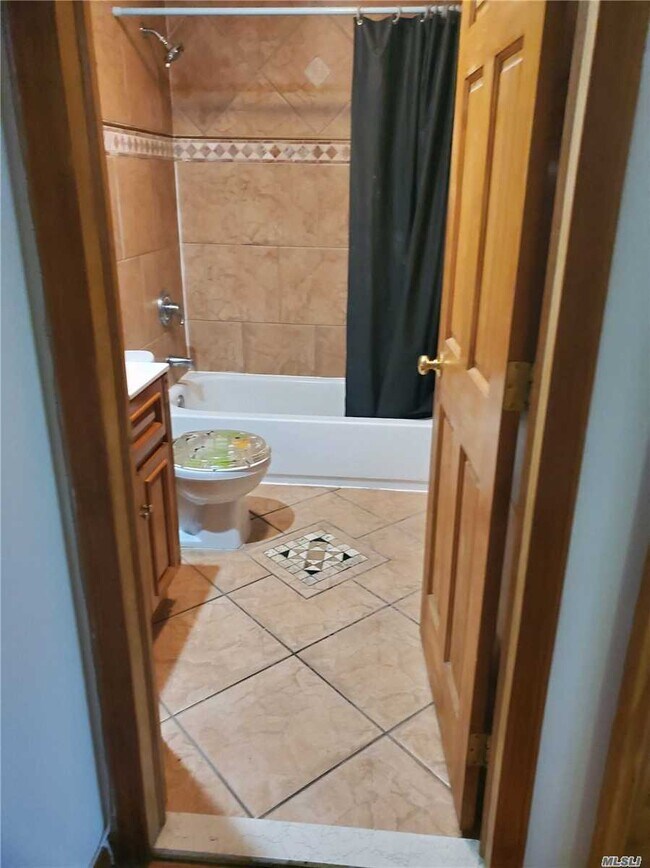 Building Photo - 54-06 Metropolitan Ave