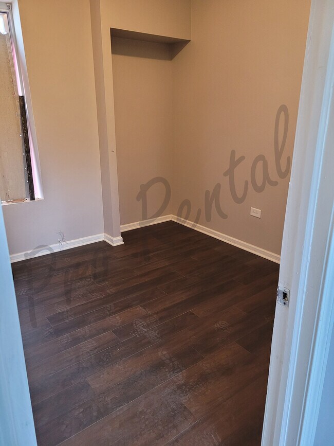 new floors - 3841 W Augusta Blvd