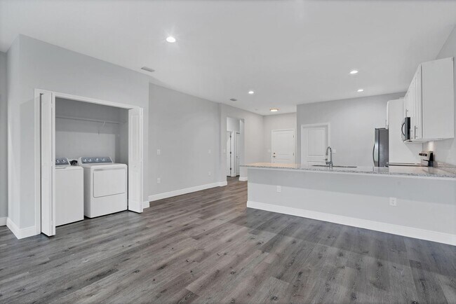 Building Photo - Brand new Duplex stocked with upgrades