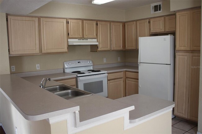 Foto del edificio - 13941 Fairway Island Dr