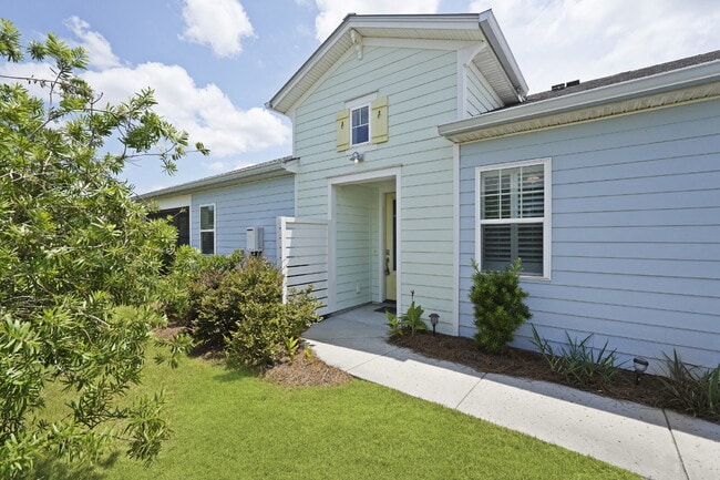 Building Photo - "Charming 2-Bedroom Retreat with 2 Baths and Den - 1558 Sq. Ft. of Comfort in Latitude Margaritav...