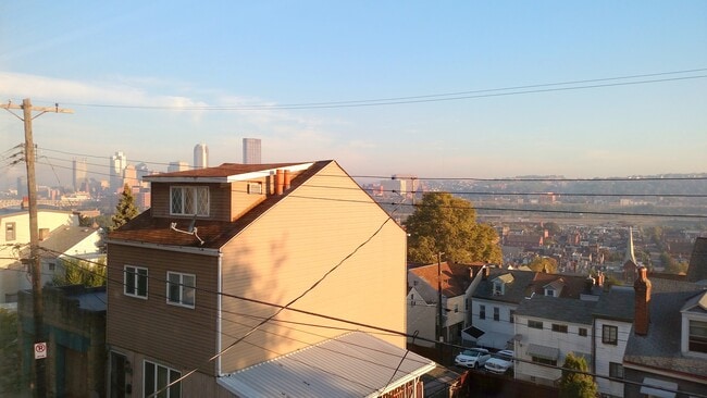 Building Photo - Large 2 Bed/1.5 Bath- Available August 1st! Central Air - Off Street Parking - Beautiful Back Yar...