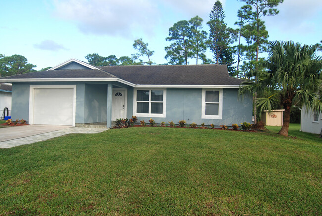 Building Photo - 6279 SE Poinciana Ln