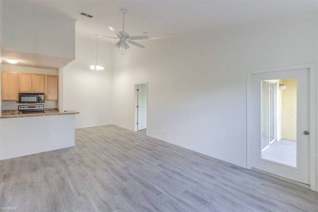 Building Photo - 10201 Courtney Palms Blvd