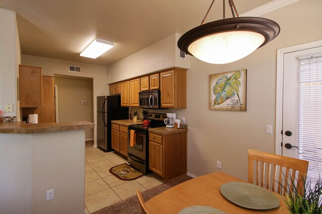 Building Photo - 7050 E Sunrise Dr