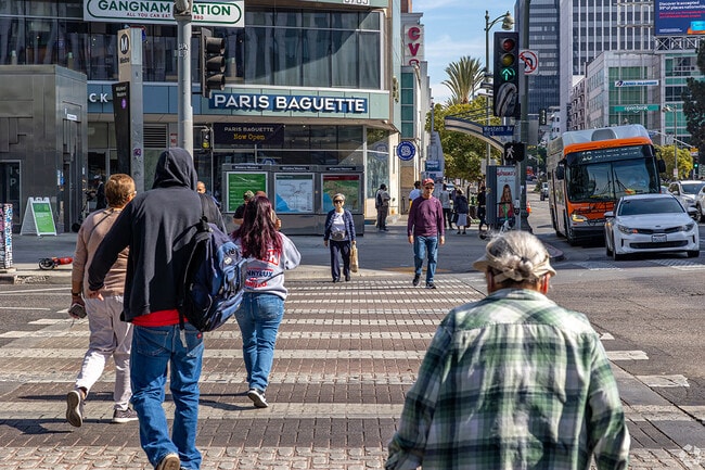 Many residents walk around Koreatown.