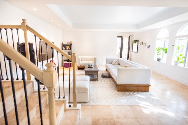 Living room view from stair - 3142 Ohio St Townhome