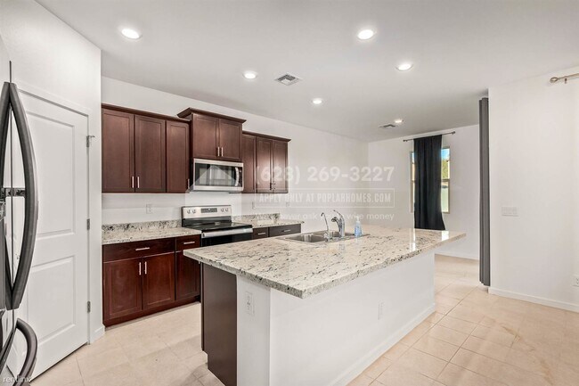 Building Photo - 3 br, 2 bath House - 1509 S 223rd Dr -