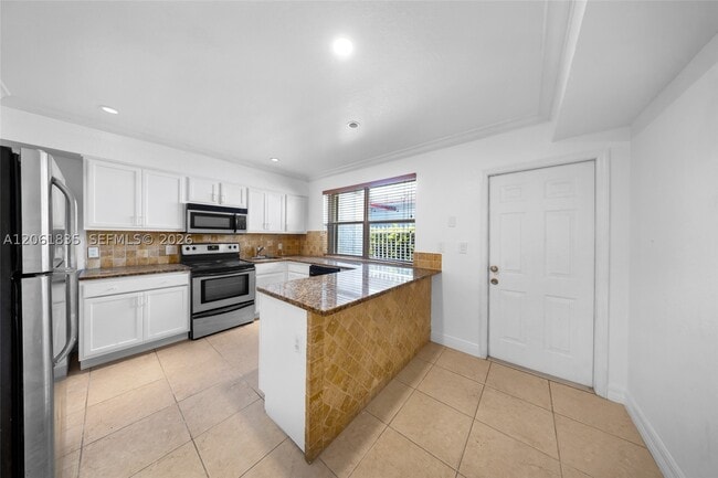 Building Photo - 7801 Hispanola Ave