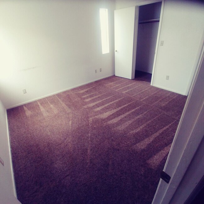 Building Photo - Single Story Townhome with 2 car attached ...