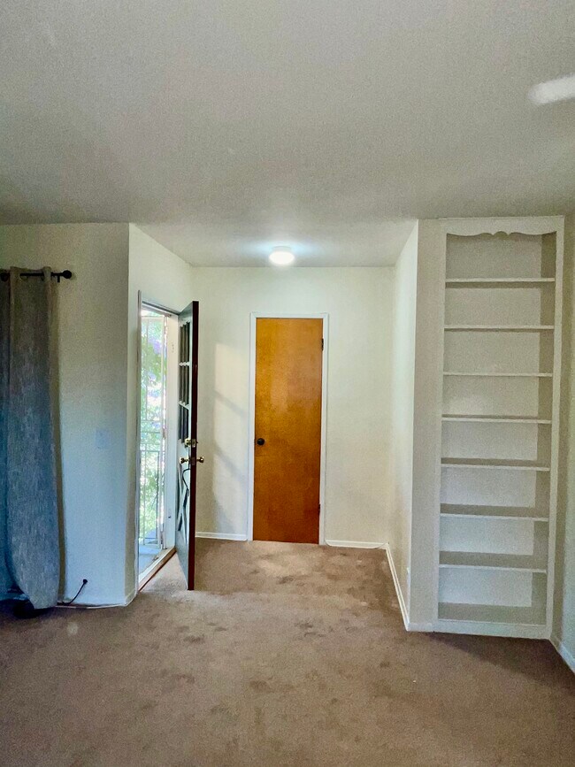 Coat closet / Built-in-Book Shelves - 1280 N Altadena Dr