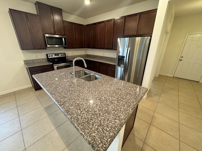 Foto del edificio - 12093 Stone Bark Trail