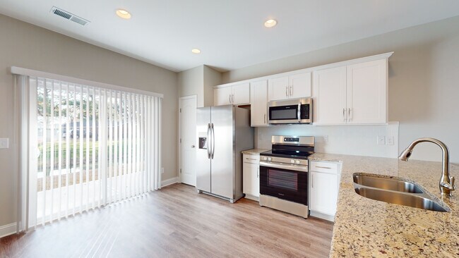 Foto del edificio - 11@Main Townhomes