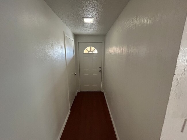 Building Photo - Single story home with large backyard and huge carport with plenty of storage.