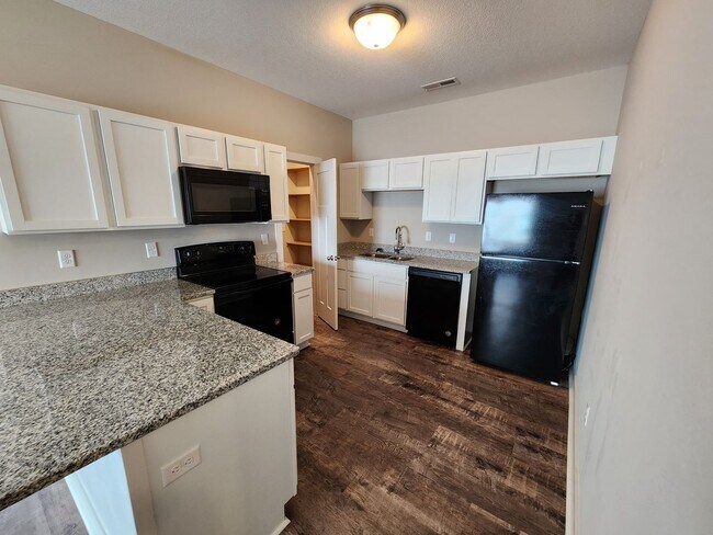 Building Photo - New Duplex - 2 Car Garage - Close to McCon...