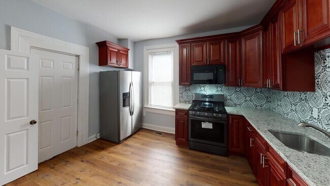 Foto del edificio - 706 E 43rd St