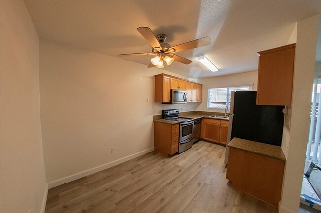 Building Photo - 2BR/1BA Clairemont Condo Freshly Painted, New Vinyl Plank Flooring Throughout Patio, 1 Parking Space
