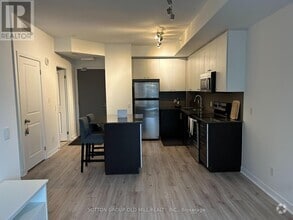 Building Photo - 8-208 Fieldway Rd