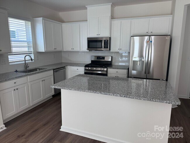 Foto del edificio - 8122 Ramsburg Dr