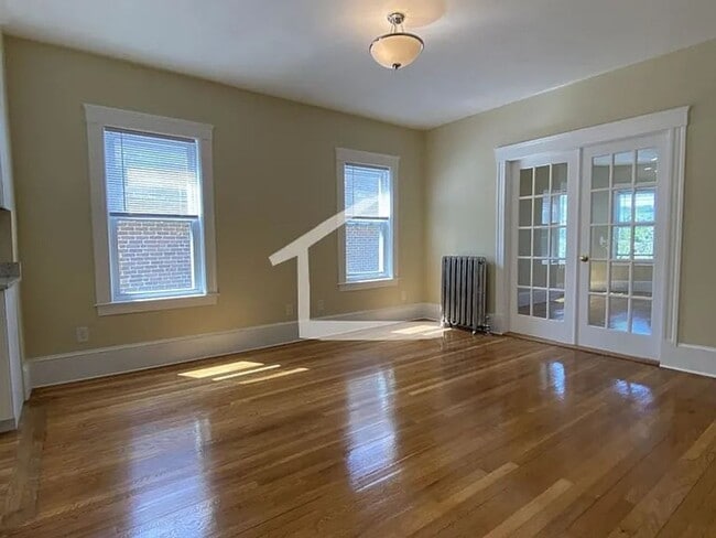 Building Photo - Washington Sq. Area, Heat, Hot Water Included, Lage Bedrooms, Eat-in Kitchen, Porch, Laundry on a...