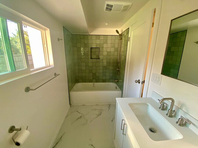 hallway bath with soaking tub - 5515 Blank Rd