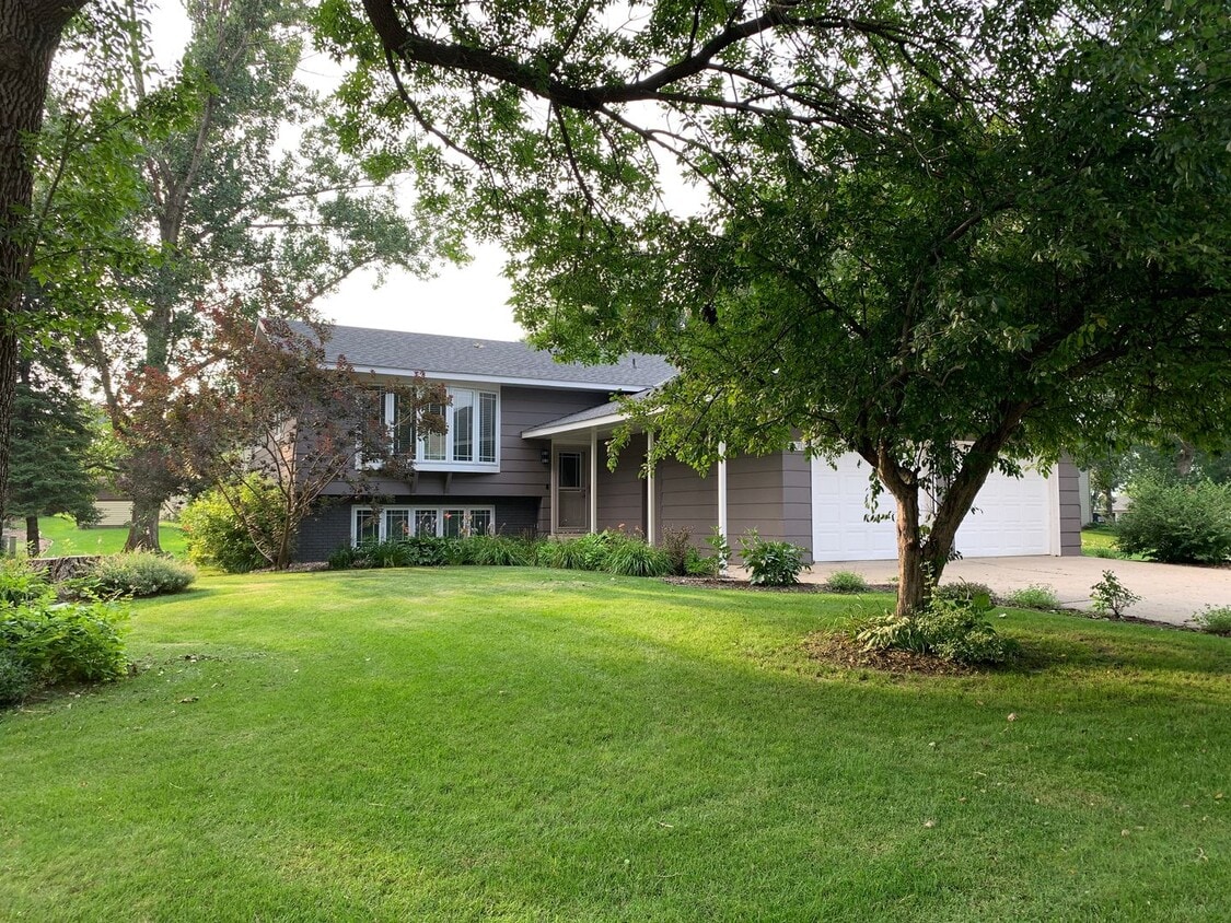 Primary Photo - Beautifully Landscaped Split-Level Home