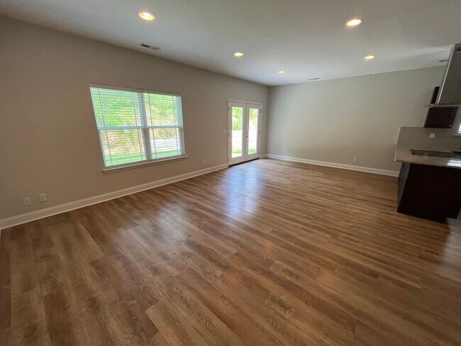 Building Photo - 4 BR | 2.5 BA | Townhome Close to Volkswagen, Amazon & Fed Ex