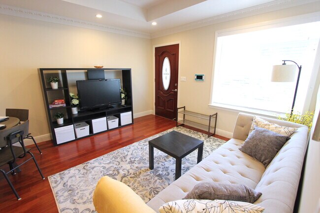 Living area and front door with large window. Lots of natural light. Unit is unfurnished. Furnished - 309 Rio Verde St