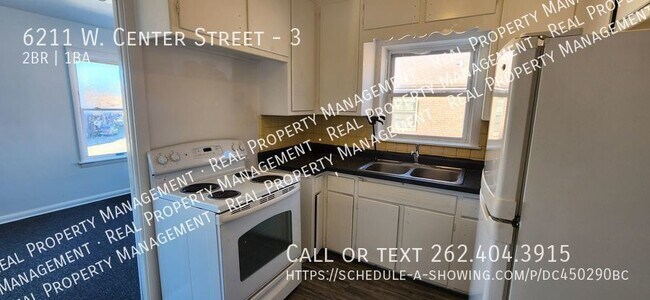 Building Photo - Two Bedroom upper unit