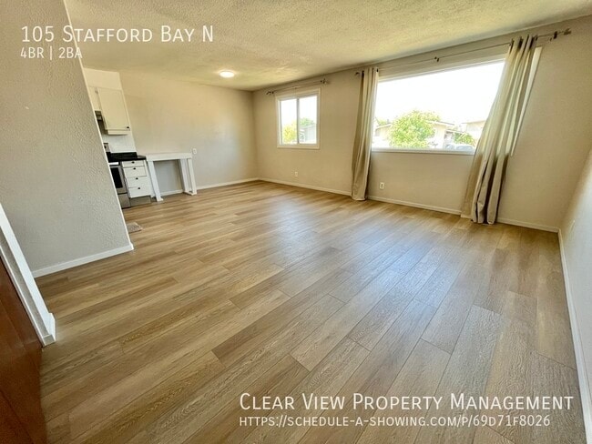 Building Photo - Perfect Fully Fenced family home in North Lethbridge with AC!!  **PROMO: 1ST HALF MONTH FREE