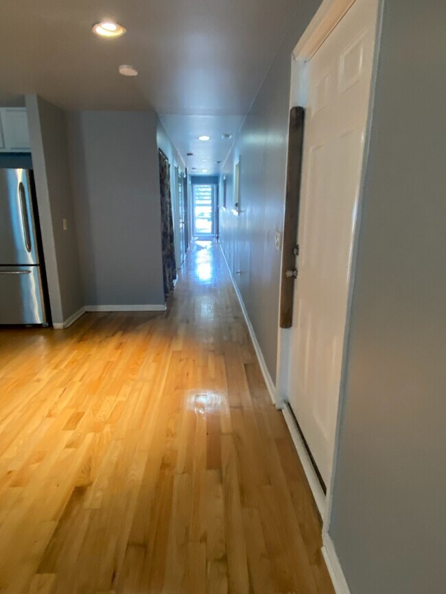 Entryway/ Hallway to bed/baths - 3702 W Lexington St