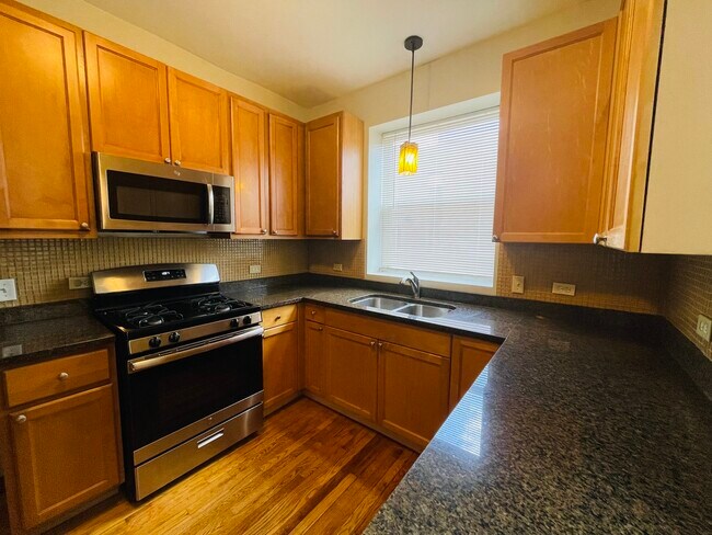 Foto del edificio - 6451 S Greenwood Ave