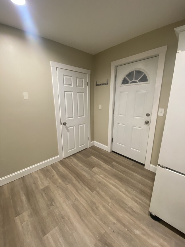 Kitchen showing backdoor and pandry droo - 365 Cold Spring Ave