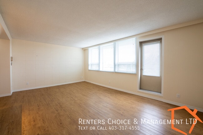 Building Photo - Adult Only Building with Elevator + Laundry Onsite