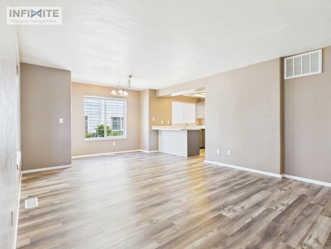 Building Photo - 2 Bedroom | 2 Bathroom Condo Single-Level Lower-Level Living