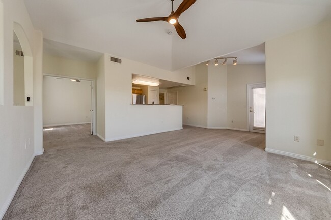 Building Photo - Move-In Ready Condo with Private Balcony & Modern Upgrades