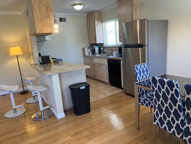 kitchen w/island granite - 229 Ramona St