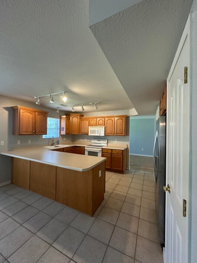 Foto del edificio - 2302 Windstone Dr