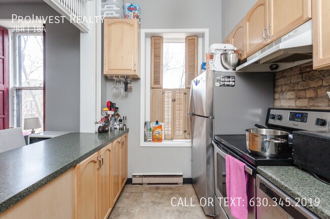 Building Photo - Available July 1st! Sun-filled 2bed/1bath ...