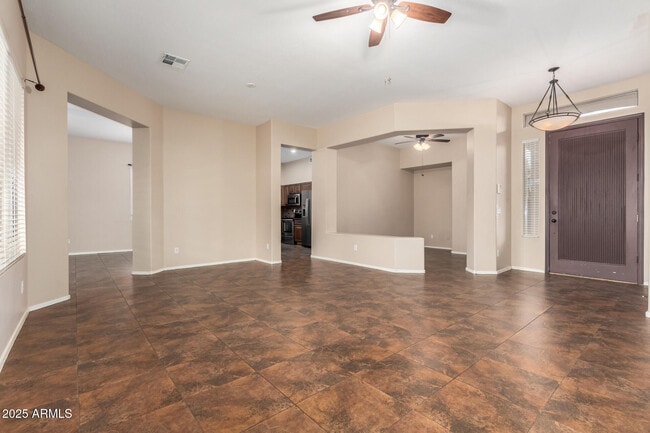 Building Photo - 6923 W Lone Cactus Dr