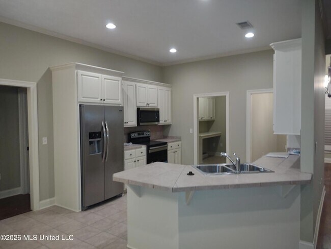 Foto del edificio - 446 Ash Tree Ln