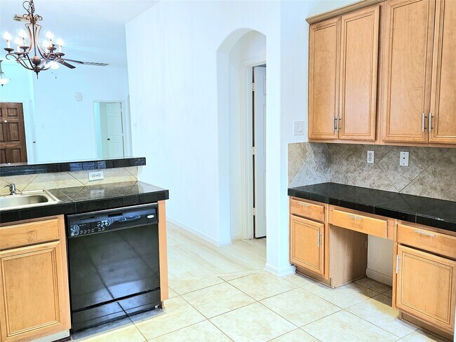 Foto del edificio - 8827 Windfern Trace Dr