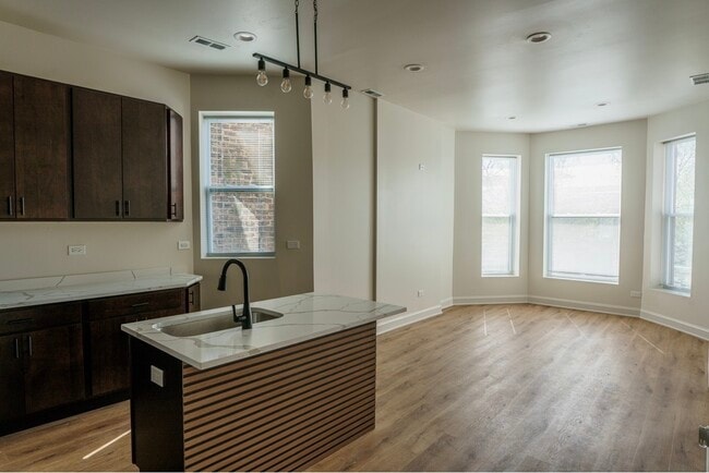 Building Photo - 6613 S Vernon Ave
