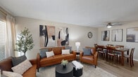 Located in the Beechwood community of Memphis, TN, this single-floor 2-bedroom, 2-bathroom residence offers a well-organized and functional layout. The combined living and dining area forms the heart of the home, featuring warm hardwood-style flooring, neutral walls, and large windows that invite natural light. The living room provides a comfortable, open feel with ample space for seating and entertaining.

The kitchen is outfitted with white shaker-style cabinetry, light granite countertops, a classic subway tile backsplash, and stainless steel appliances including a full-size refrigerator and dishwasher. A skylight adds brightness to the space.

Both bedrooms are carpeted and offer a quiet retreat. The primary bedroom is a well-proportioned room with a window providing natural light. The second bedroom mirrors this comfortable design. Each room is served by its own full bathroom, both featuring a tub/shower combination.

Connecting the spaces are two hallways that ensure smooth flow throughout the home, complemented by a dedicated closet for additional storage. The textured ceilings, consistent neutral color palette, and hardwood-style flooring in the main living areas tie the residence together into a cohesive, move-in-ready space.