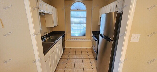 Building Photo - 7117 Wagonwheel Rd