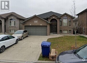 Building Photo - 4832 Periwinkle Crescent
