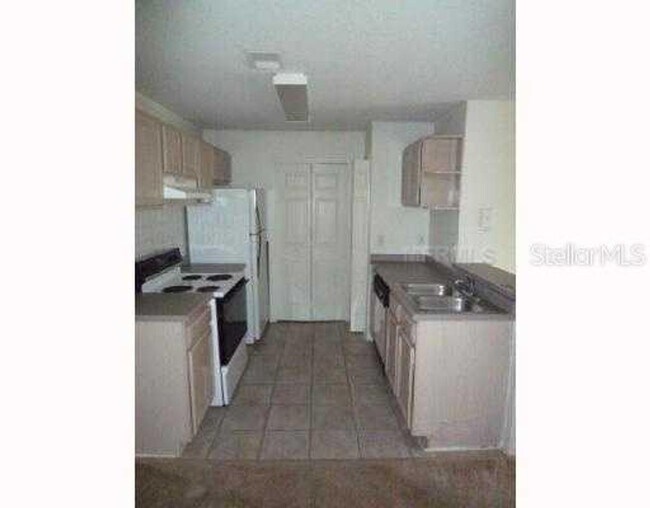 Building Photo - 8915 Latrec Ave. Unit 203