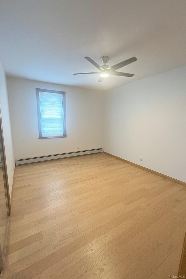 Building Photo - 61-20 55th Dr