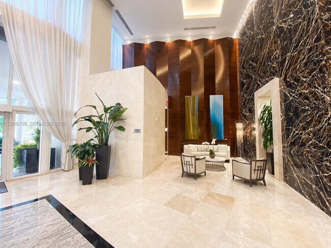 Building Photo - 15811 Collins Ave